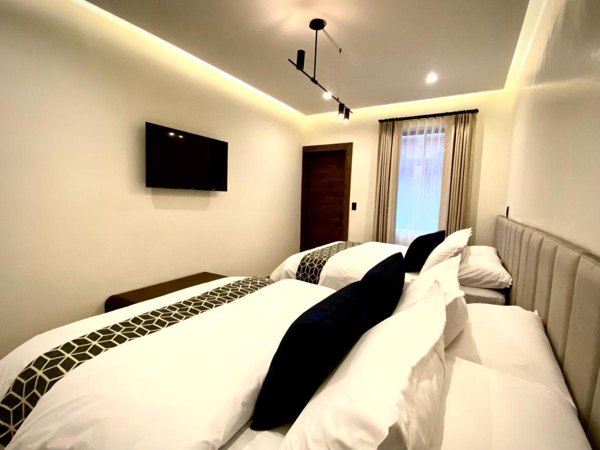 Wanderlot - Hotel Plaza Central Riobamba Bagian luar foto