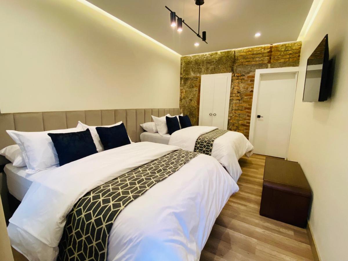 Wanderlot - Hotel Plaza Central Riobamba Bagian luar foto
