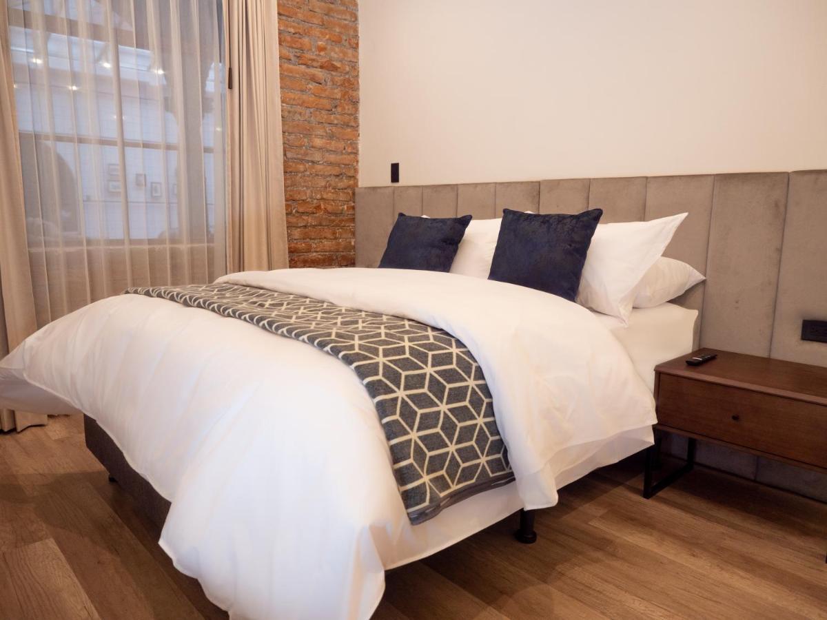 Wanderlot - Hotel Plaza Central Riobamba Bagian luar foto
