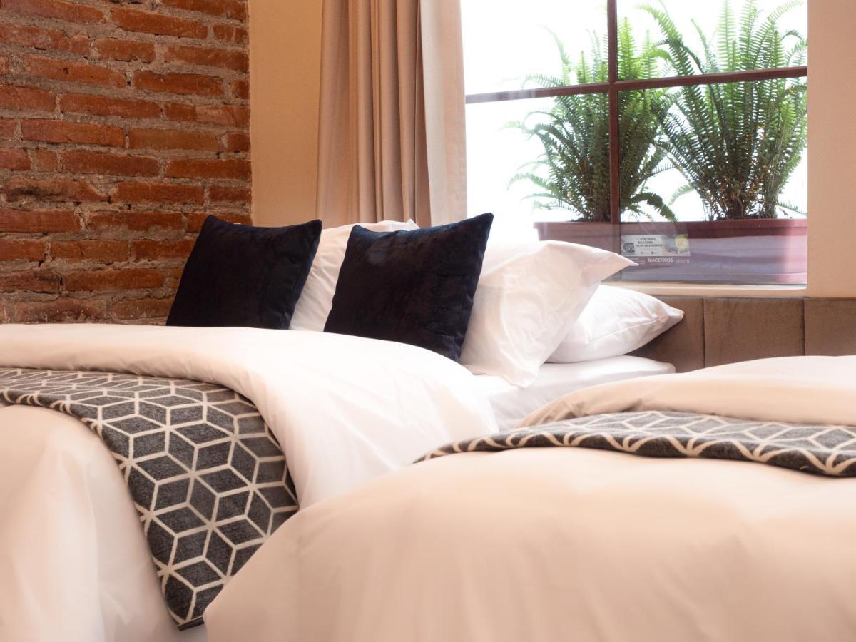 Wanderlot - Hotel Plaza Central Riobamba Bagian luar foto