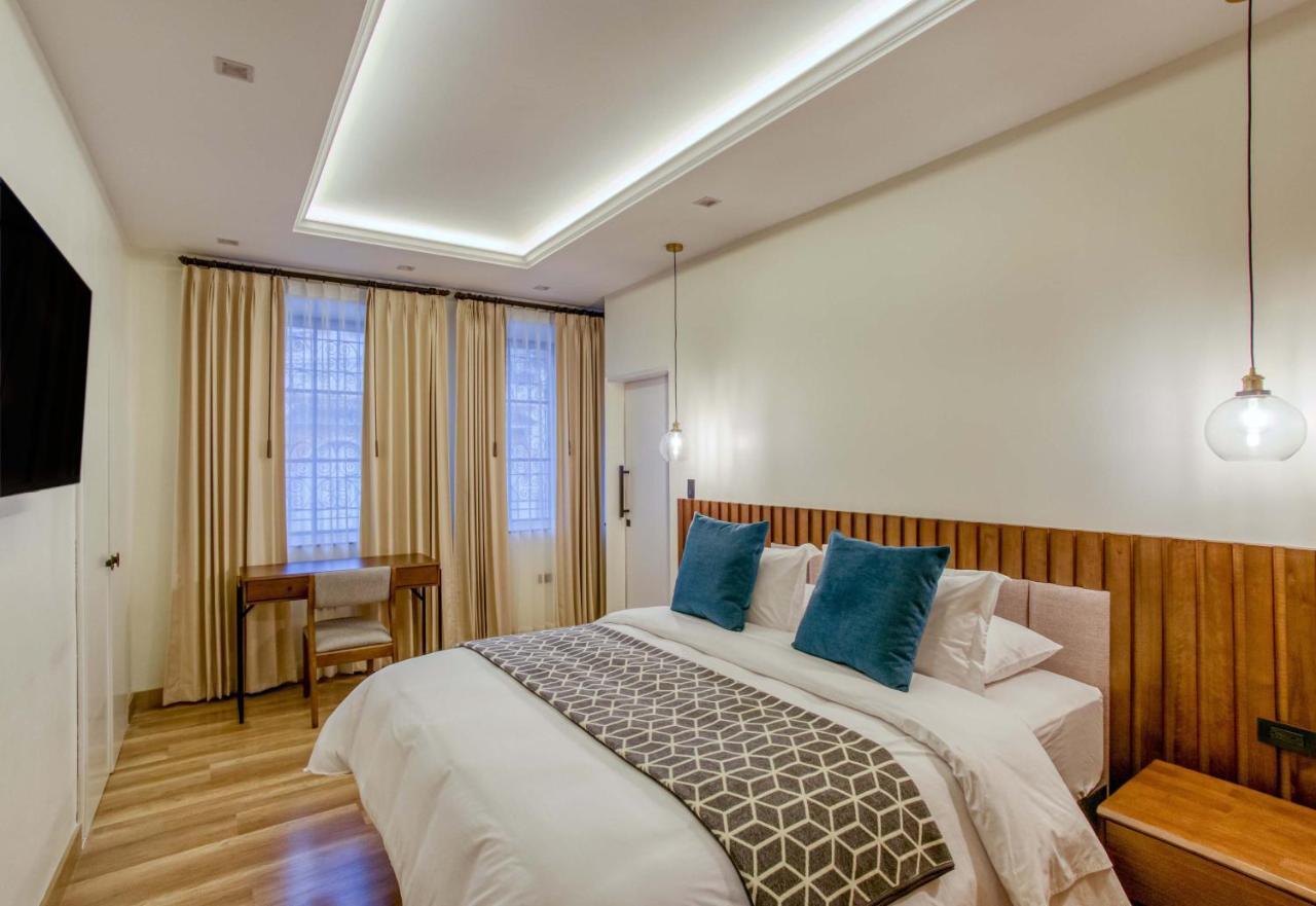 Wanderlot - Hotel Plaza Central Riobamba Bagian luar foto