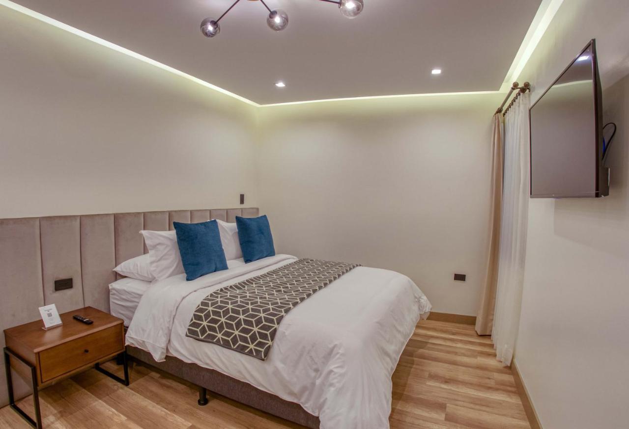 Wanderlot - Hotel Plaza Central Riobamba Bagian luar foto