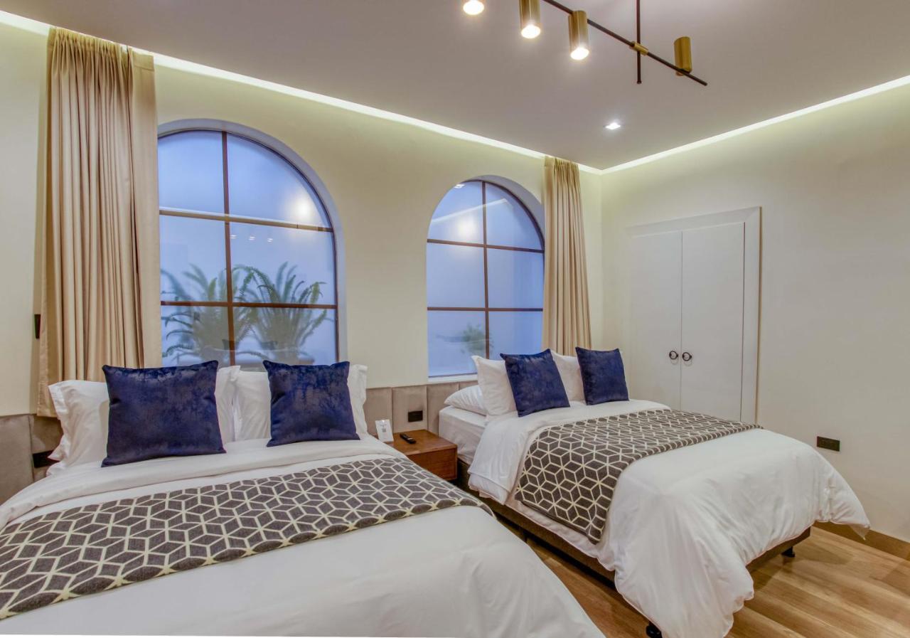Wanderlot - Hotel Plaza Central Riobamba Bagian luar foto