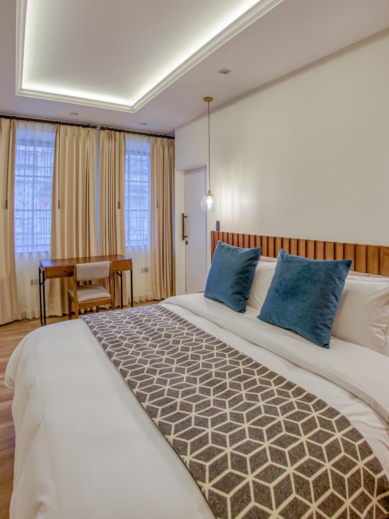 Wanderlot - Hotel Plaza Central Riobamba Bagian luar foto