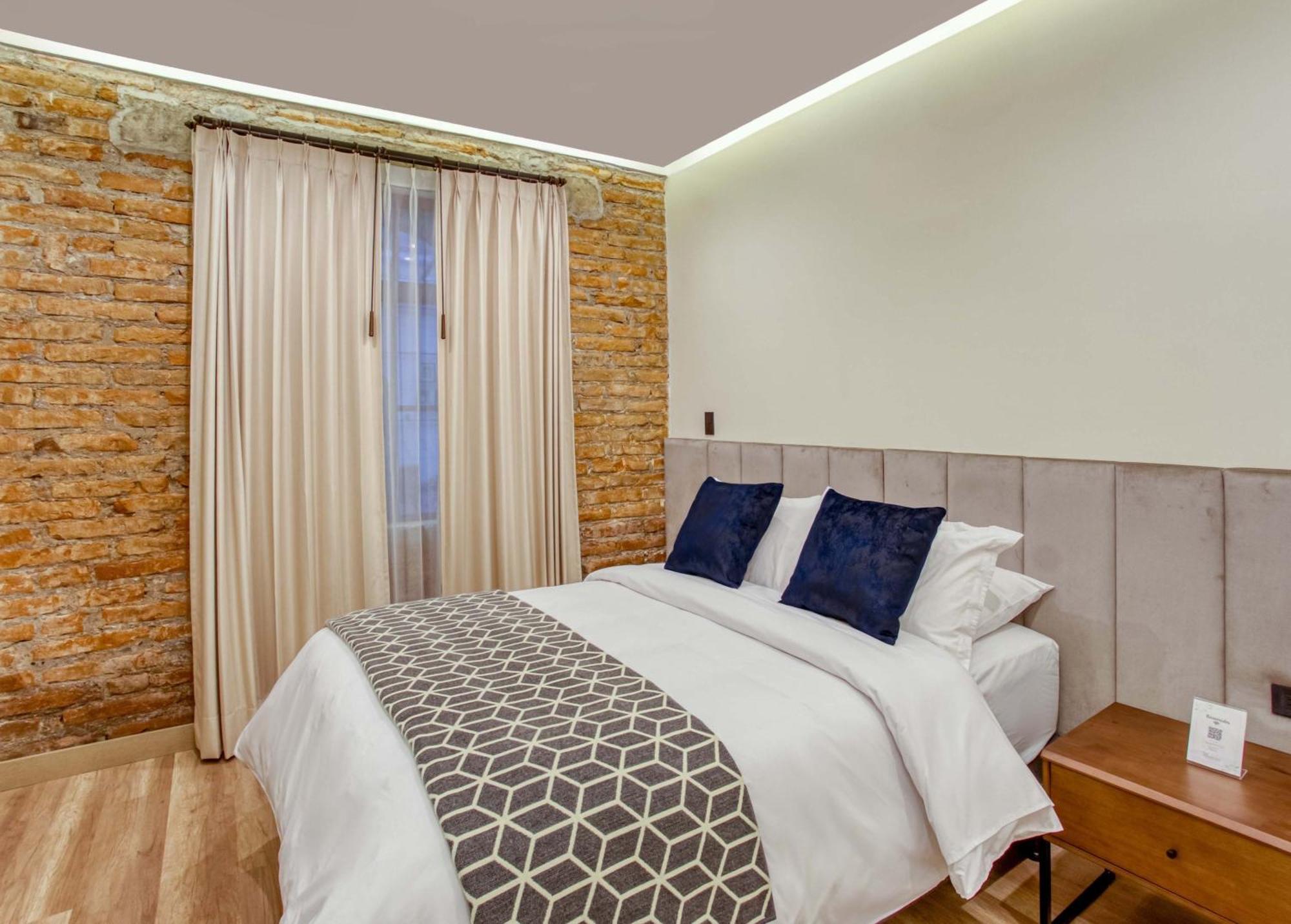 Wanderlot - Hotel Plaza Central Riobamba Bagian luar foto